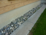 Holzhaus auf Betonsockel